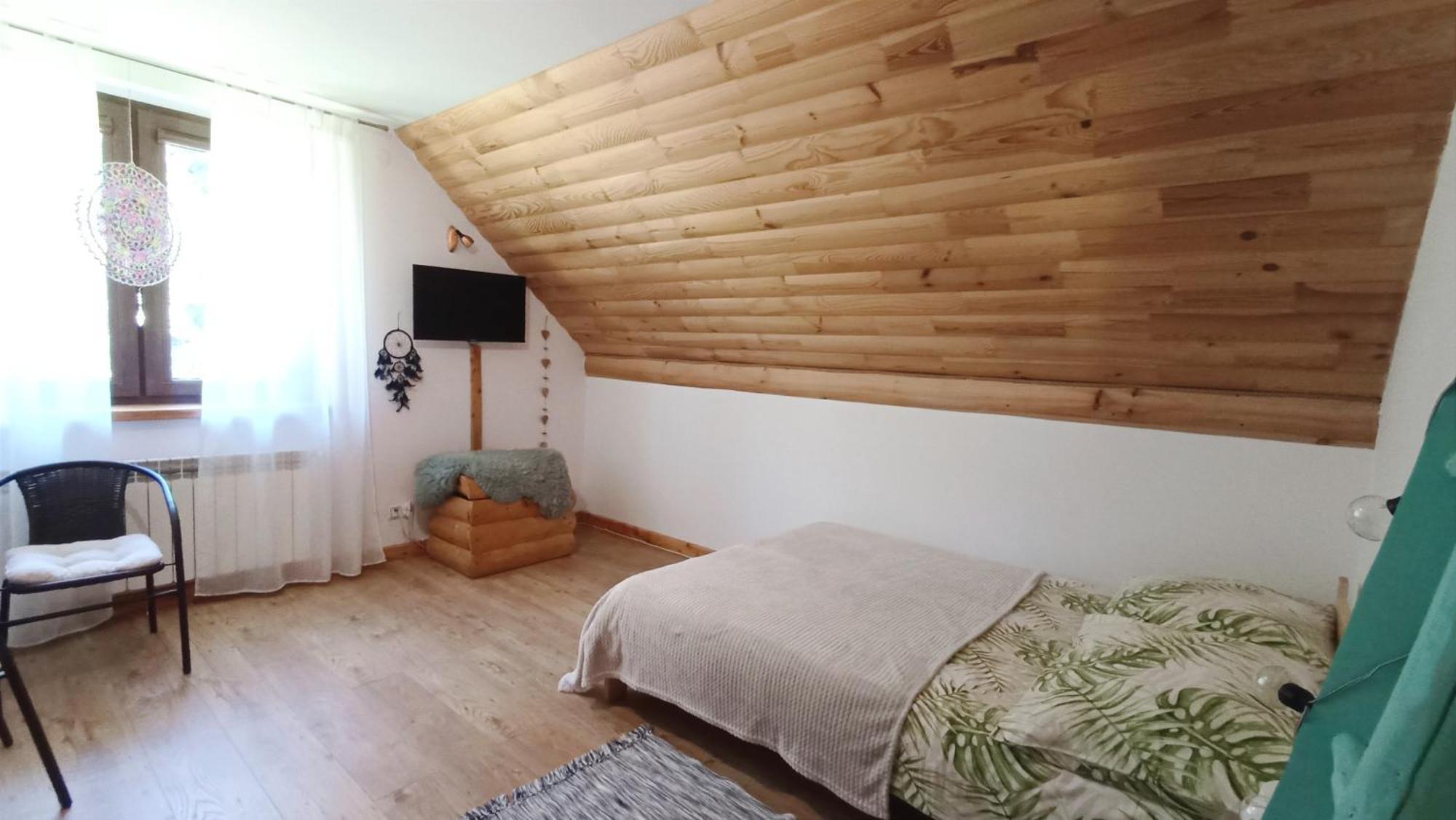 Zacisze Drwala Pensionat Lutowiska Rum bild